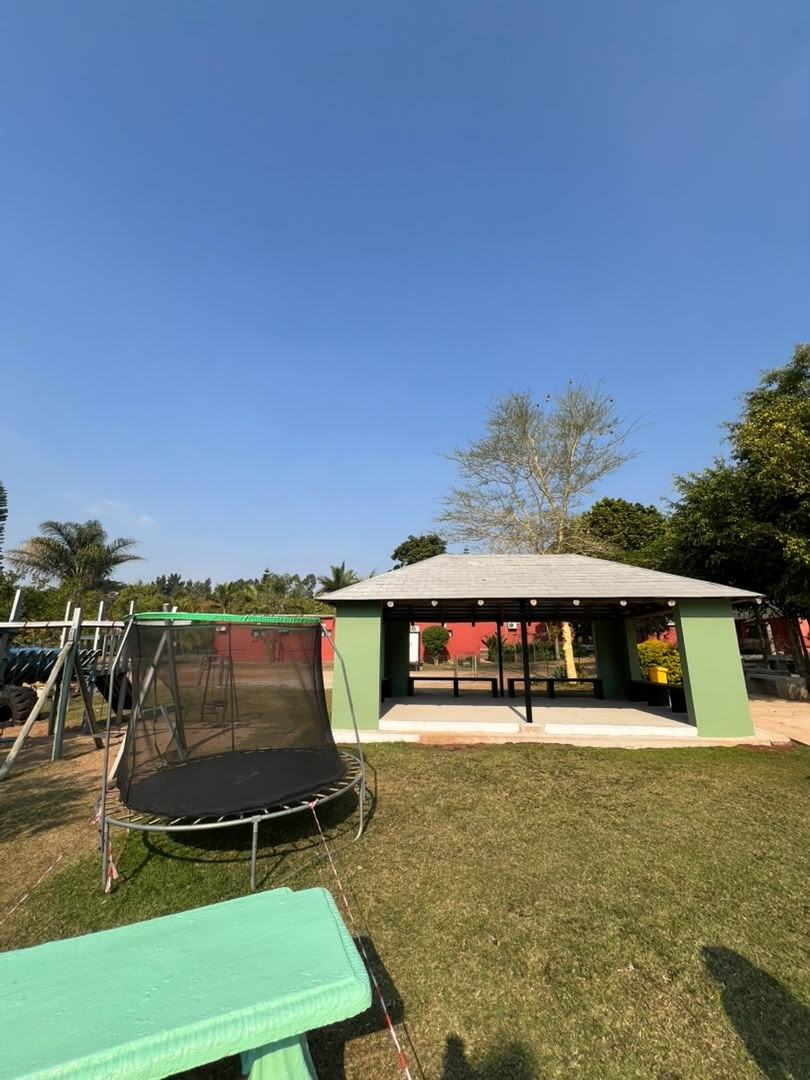 Trampoline and green pavilion